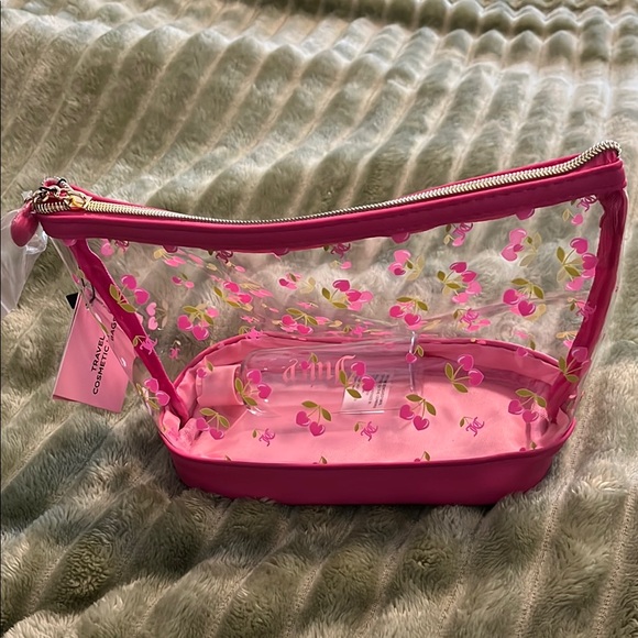 Coach Handbags - Juicy couture, cosmetic bag, new with tag it has a juicy bottle
